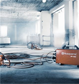 Efficient track sawing in thick reinforced concrete walls with high-frequency electric wall sawing system Husqvarna WS 482 HF