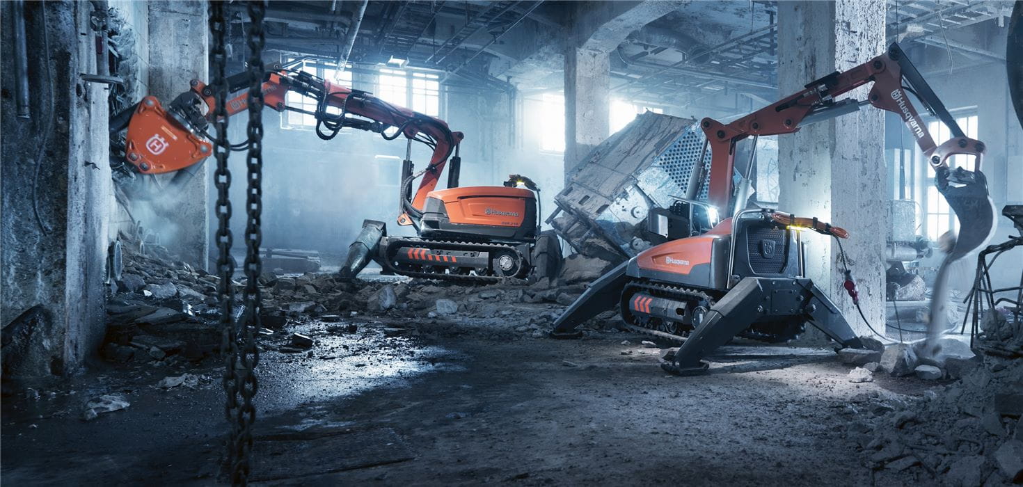 Remote demolition robots dismantle concrete structures indoors: Husqvarna DXR 310 and DXR 140
