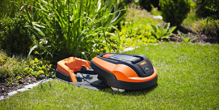 summer lawn care blog, robotic lawnmower charging station